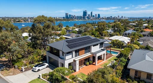 Aerial view of a Perth home with rooftop solar panels.